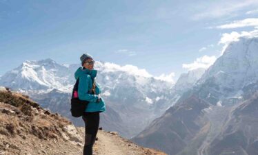 A woman hiking Annapurna Circuit Trek, Himalayas, Nepal.